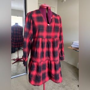 Buffalo plaid long-sleeve babydoll dress.